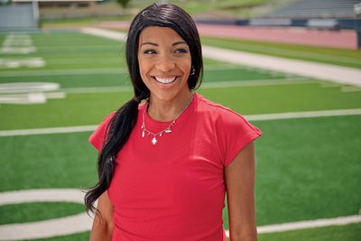 Model wearing Collegiate Necklace with charms