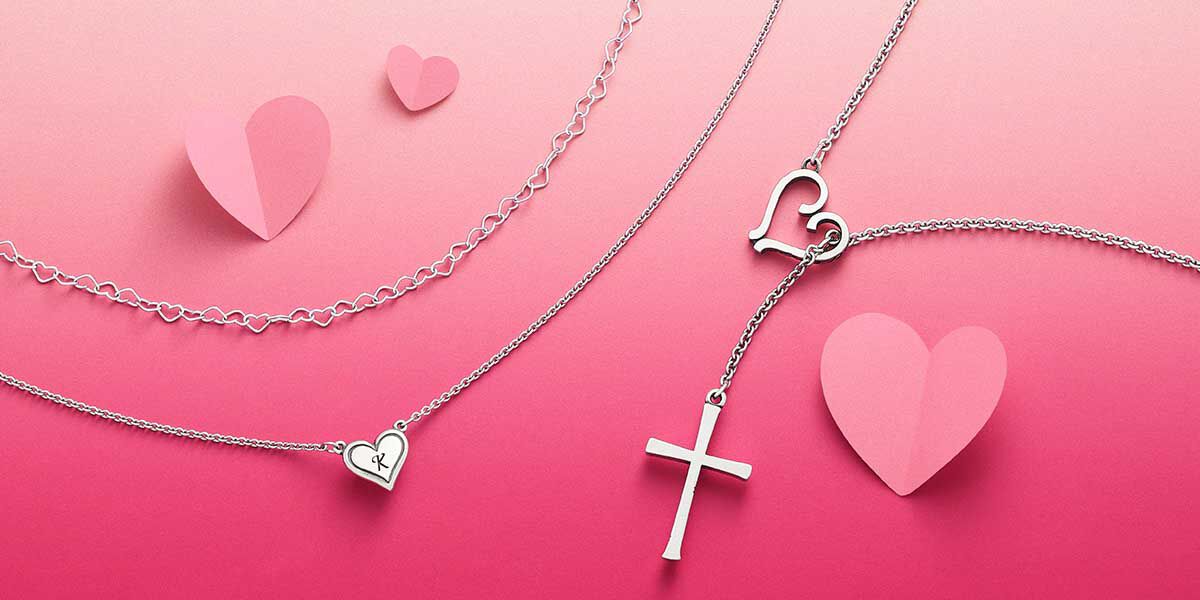 Sterling silver heart and cross necklaces.