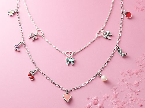 Layered Necklaces with Several Charm Styles