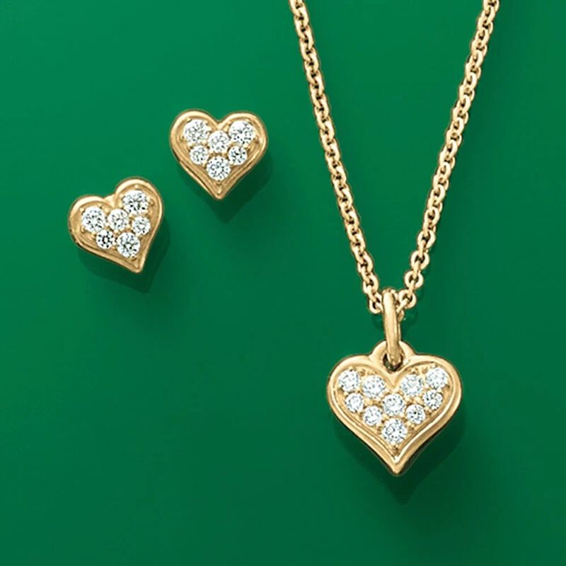 Diamonds and 14K gold heart studs and pendant on a 14K Gold chain
