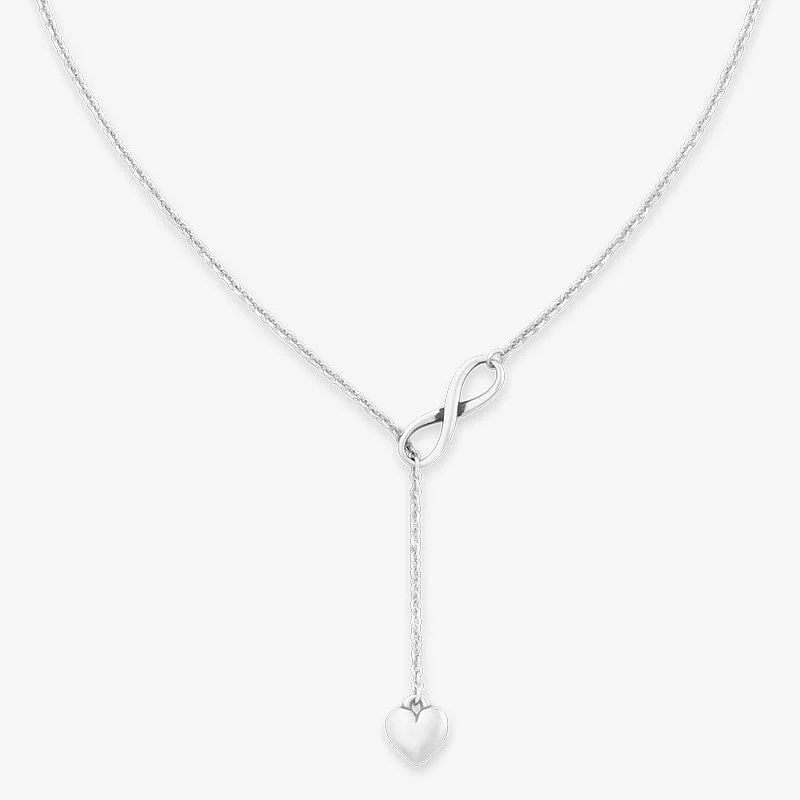 Sterling silver heart drop necklace.