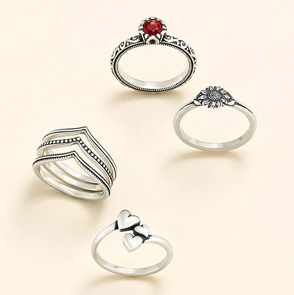 sterling silver flower, heart, and gemstone rings