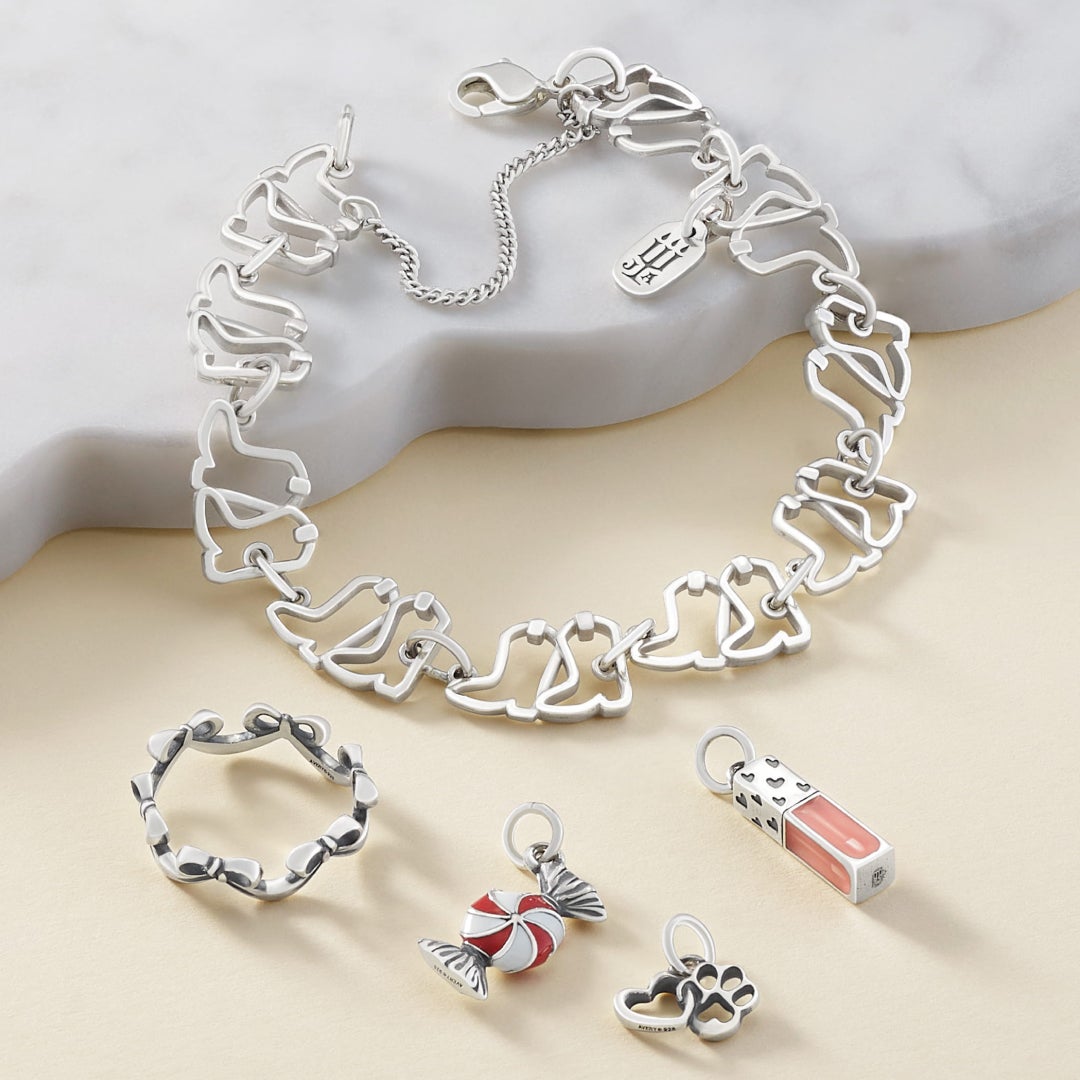 Jewelery in sterling silver, gold, enamel, stackable, and gemstones