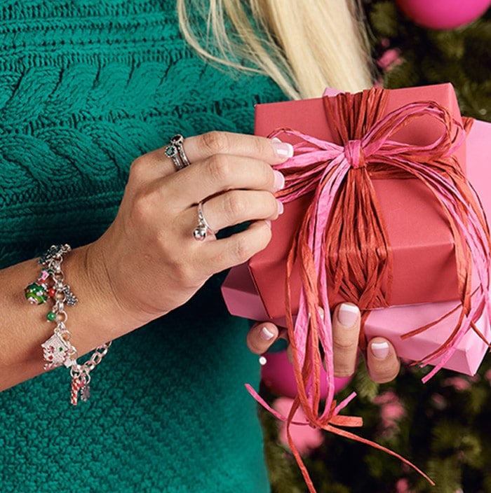 Woman opening gift box