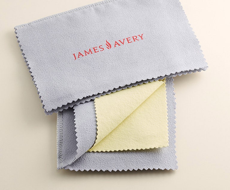 The Bronze and Silver Polishing Cloth with the James Avery logo.