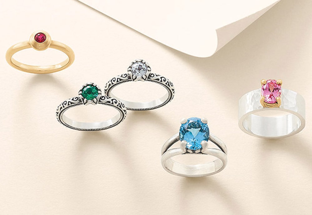 Engagement Rings with an assortment of gemstones in sterling silver and gold