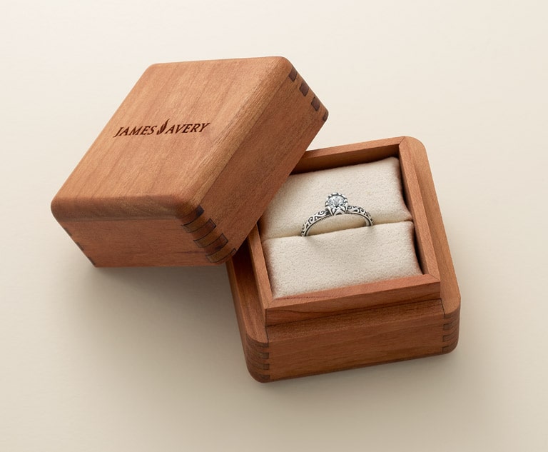 Shop wooden gift boxes featuring James Avery logo.