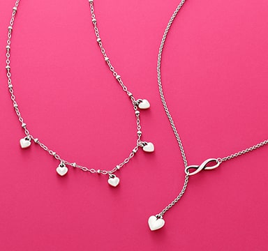 Heart drop necklace and lariat in sterling silver.