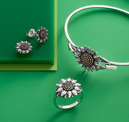 Sunflower rings, earrings and bangle in sterling silver.